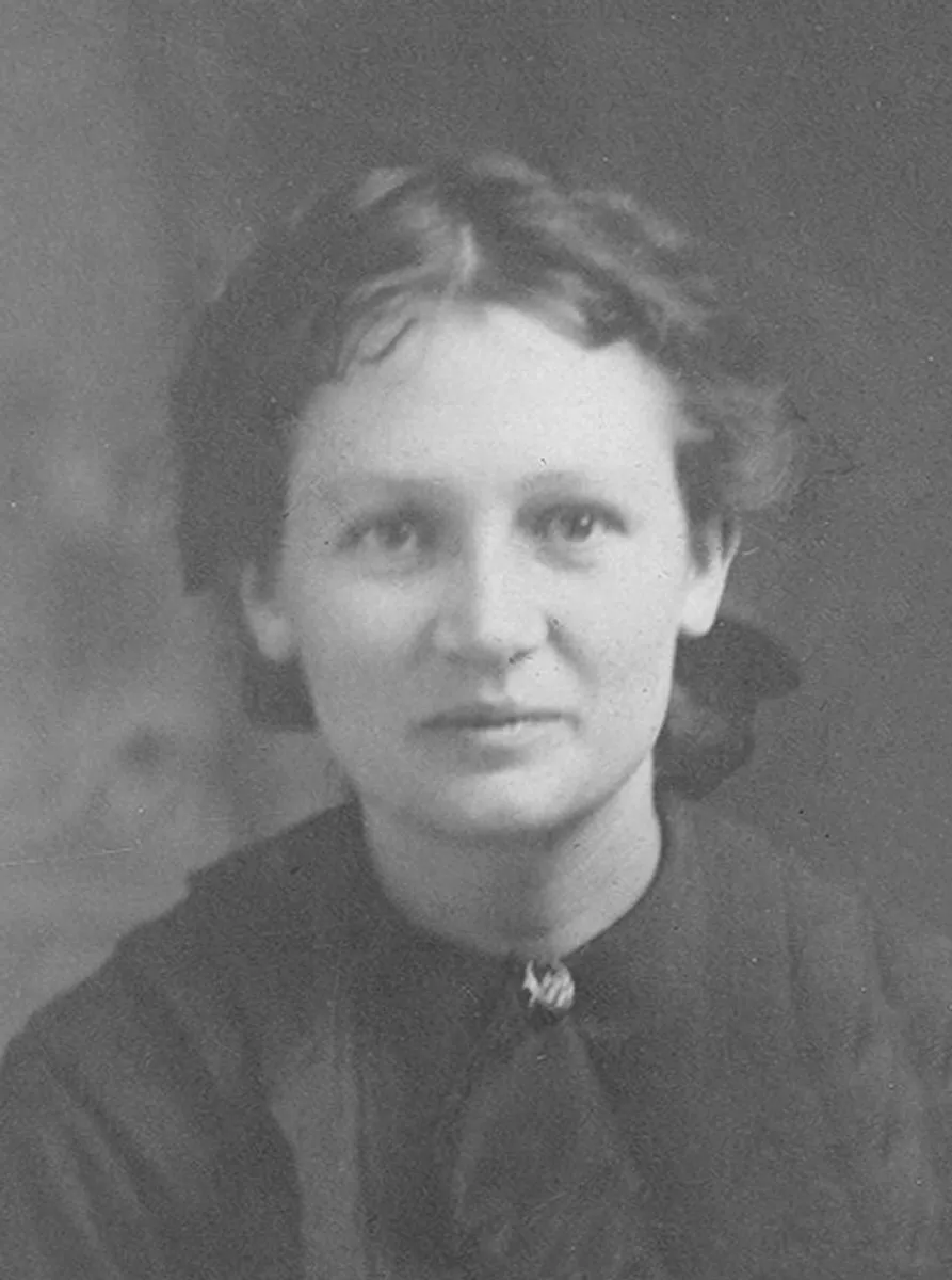 Before: black-and-white portrait of a young woman with short curled hair